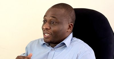 Michael Kamukulu during a media interview