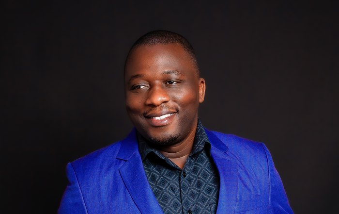 Michael Kamukulu, Executive Director of LearnImpact