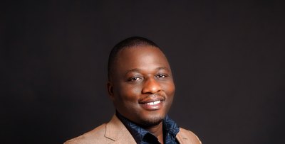Michael Kamukulu in a studio recording session