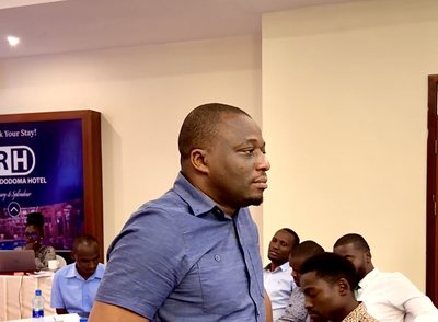 Michael Kamukulu presenting learning systems work